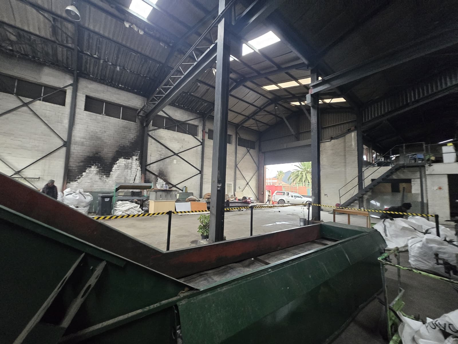Interior of the WasteGo Green processing warehouse on Freedom Way with sorting conveyors and baled stock